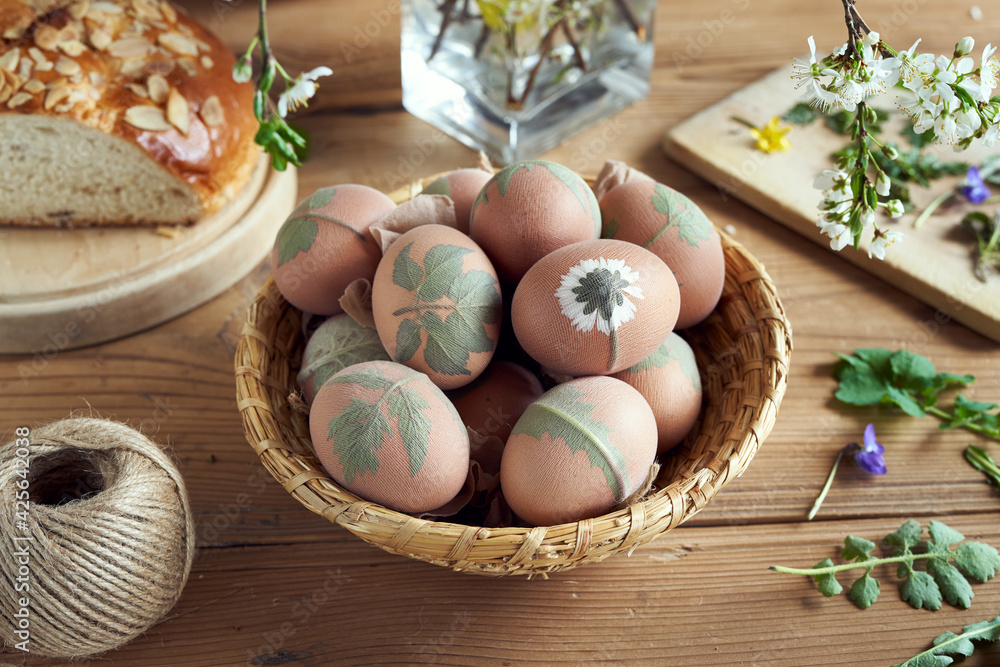 Preparation of Easter eggs for dying with onion peels in a basket Preparation of Easter eggs for dying with onion peels in a basket