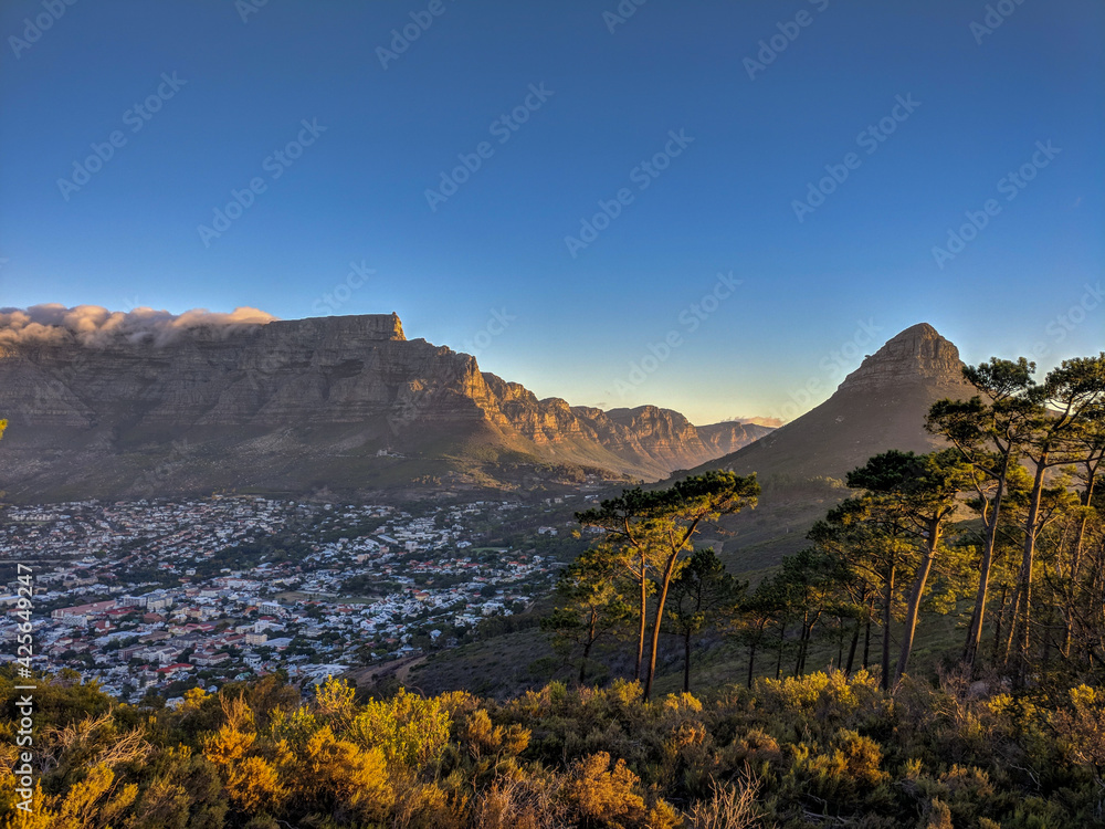 View from Signal Hill of Lion's Head and Table Mountain at sunset, Cape Town, South Africa