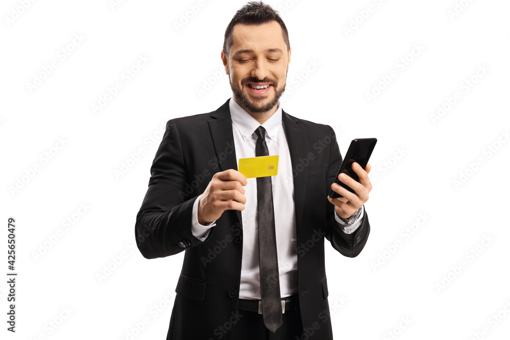 Businessman with a smartphone and a credit card Businessman with a smartphone and a credit card