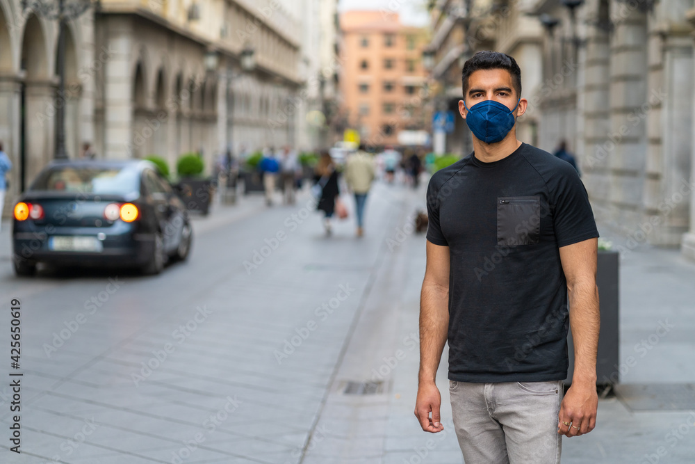 Man with a mask on her face, due to the coronavirus pandemic. Air, covid-19, 2019-ncov prevention