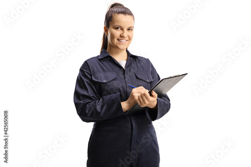 Female technician worker in a uniform holding a clipboard photo