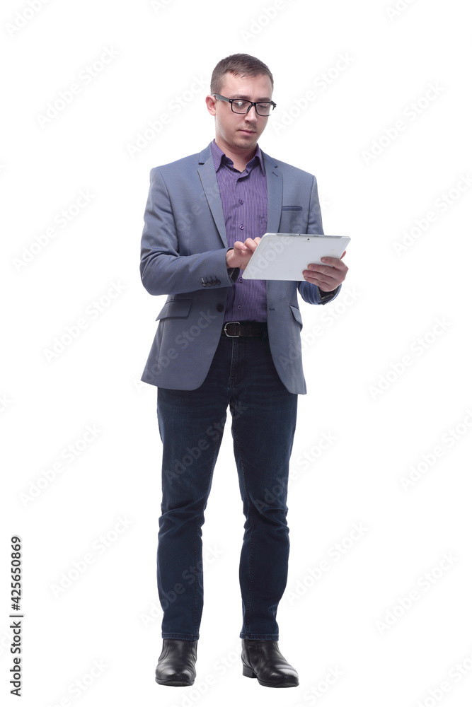 Full lenth portrait of cool businessman using electronic tablet Full lenth portrait of cool businessman using electronic tablet