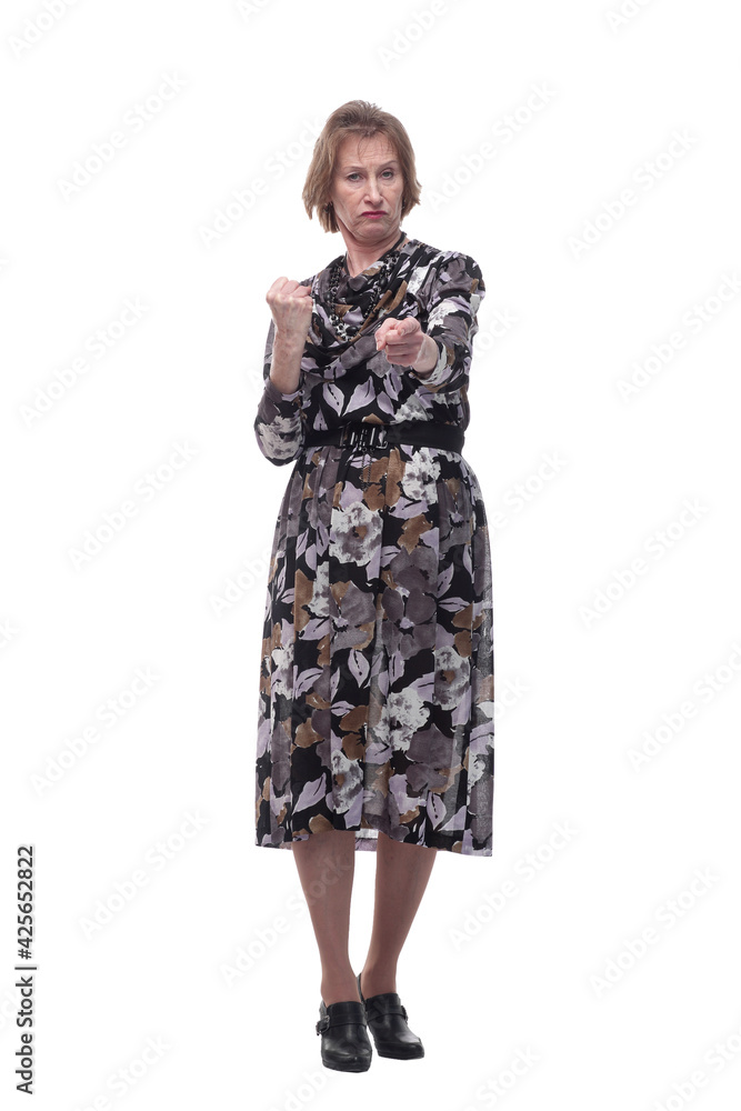 Senior beautiful woman gesturing victory, with proud and satisfied look on face and holding arm with fist pressed, showing strength or success Senior beautiful woman gesturing victory, with proud and satisfied look on face and holding arm with fist pressed, showing strength or success