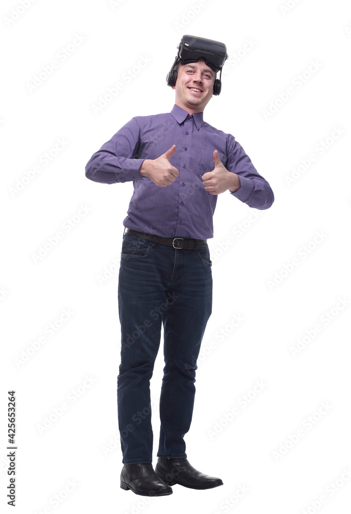 Joyful man giving two thumbs up after using a VR headset Joyful man giving two thumbs up after using a VR headset