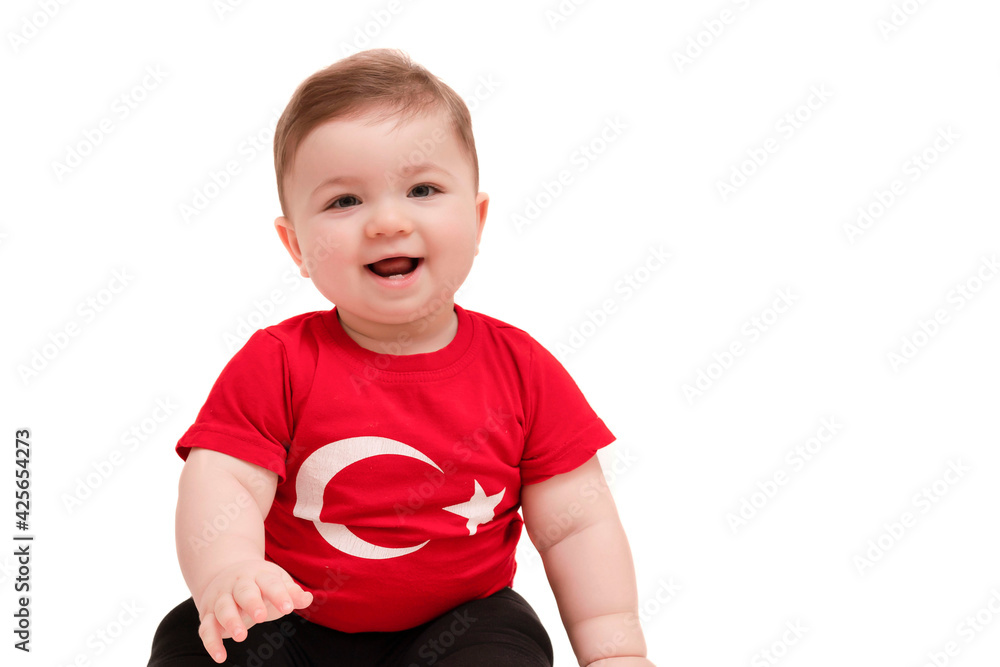 Portrait of happy little kid. Cute baby toddler with Turkish flag t-shirt. Adorable child isolated on white. Portrait of happy little kid. Cute baby toddler with Turkish flag t-shirt. Adorable child isolated on white.