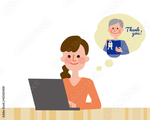 父の日のギフトをパソコンで探す女性