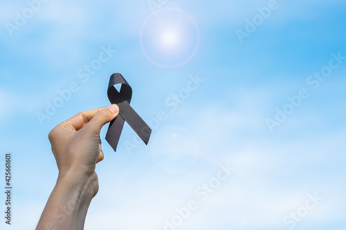 Foto Melanoma and skin cancer, Vaccine injury awareness month and rest in peace concepts