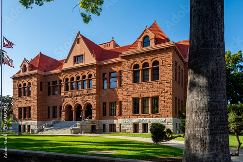 Old Orange County Courthouse, dedicated in 1901, is a granite and sandstone Romanesque Revival building located in the Santa Ana Historical Downtown District. photo