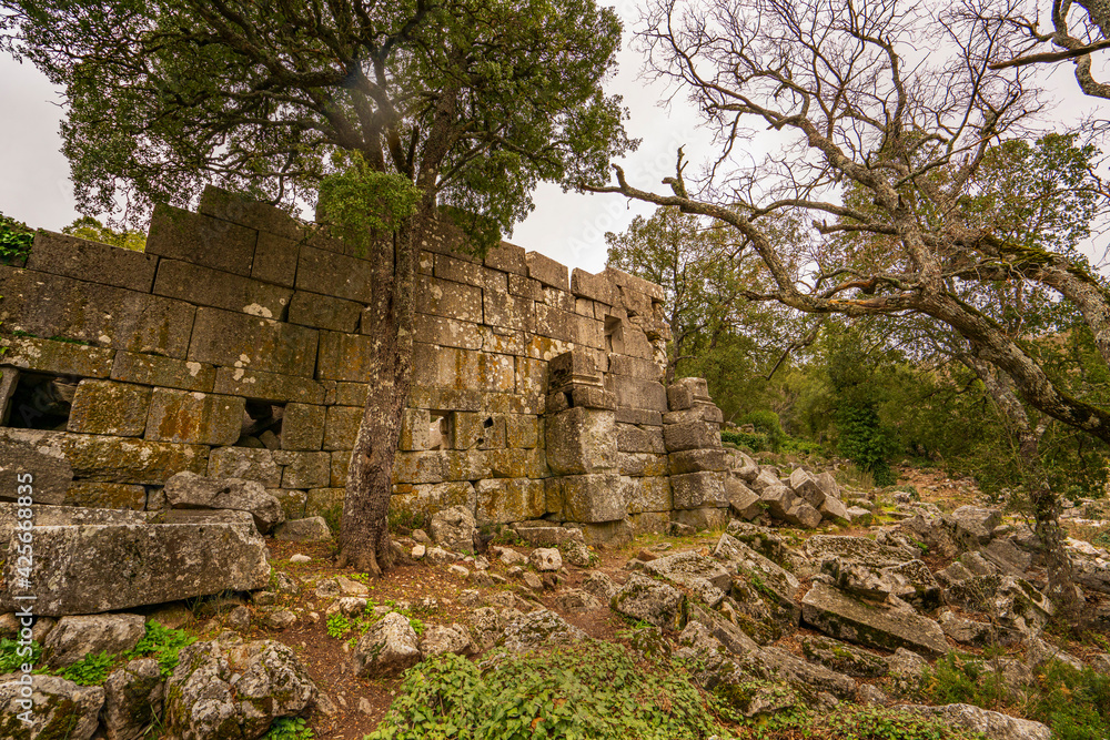 Scenic view of Termessos, which was a Pisidian city built at an altitude of more than 1000 metres at the south-west side of the mountain Solymos (Güllük Dağı) in the Taurus Mountains, Antalya Turkey Scenic view of Termessos, which was a Pisidian city built at an altitude of more than 1000 metres at the south-west side of the mountain Solymos (Güllük Dağı) in the Taurus Mountains, Antalya Turkey