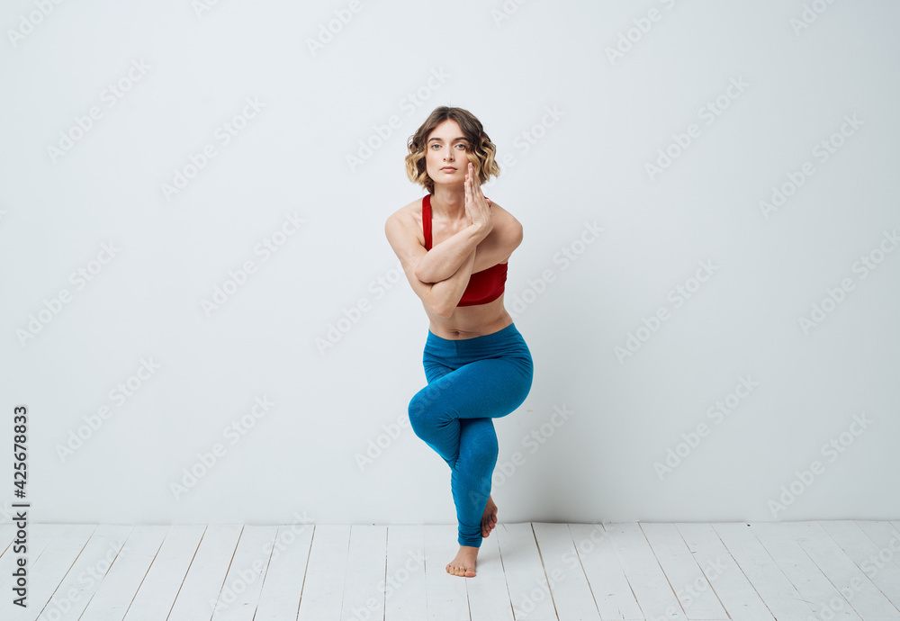 woman in blue leggings gymnastics sport fitness yoga asana woman in blue leggings gymnastics sport fitness yoga asana