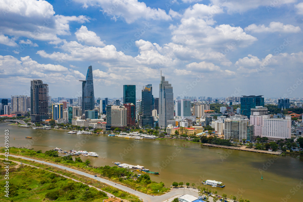 Fototapeta premium Financial office towers beside riverbank of Ho Chi Minh city, Vietnam