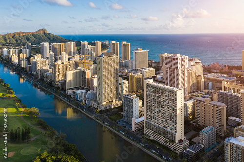 Tall buildings at Waikiki Beach and Wai Canal in Honolulu  Hawaii. Light effect applied