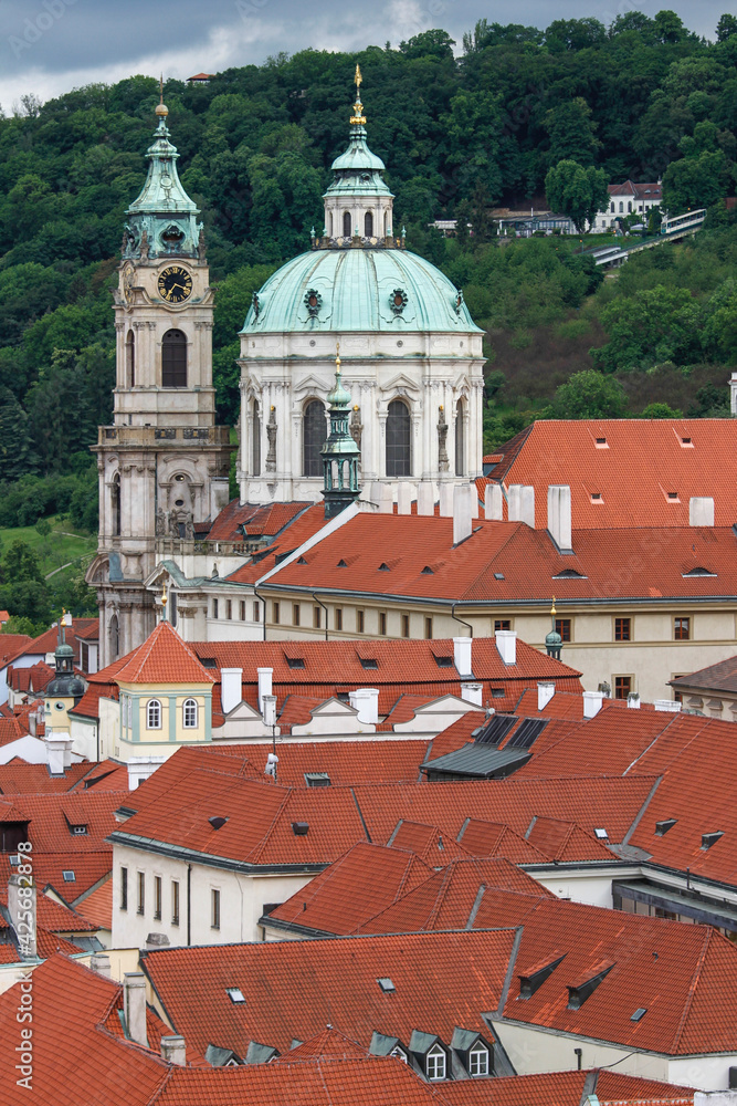 Fototapeta premium Cathedral dome and red roofs of Prague