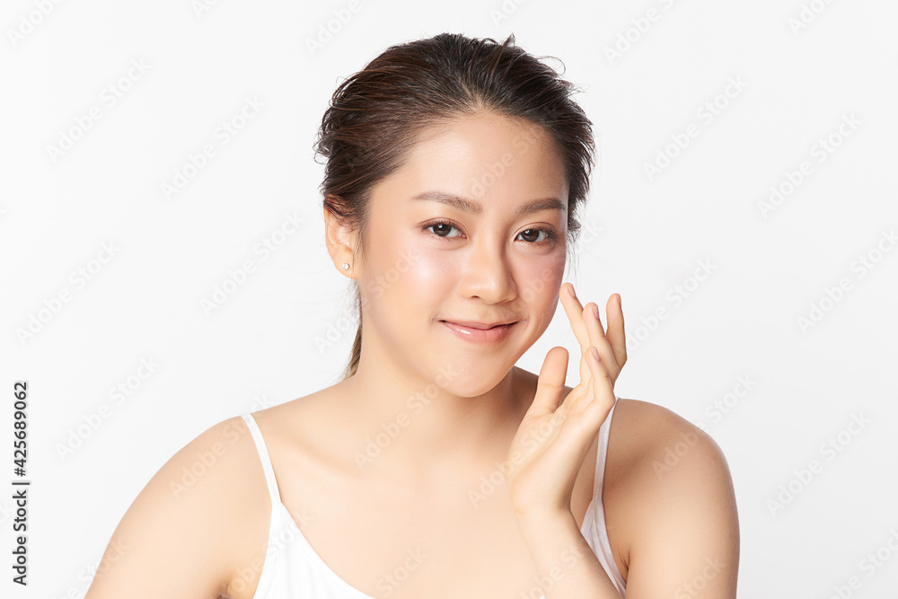 Beautiful young asian woman with clean fresh skin on white background, Face care, Facial treatment, Cosmetology, beauty and spa, Asian women portrait Beautiful young asian woman with clean fresh skin on white background, Face care, Facial treatment, Cosmetology, beauty and spa, Asian women portrait