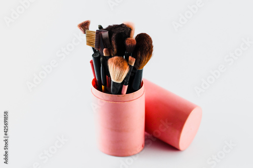 Blusher, brushes, and makeup equipment,On white background	