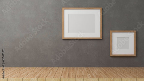 3D render, home decorations with mock up frames on grey loft wall background with copy space on wooden table © bongkarn