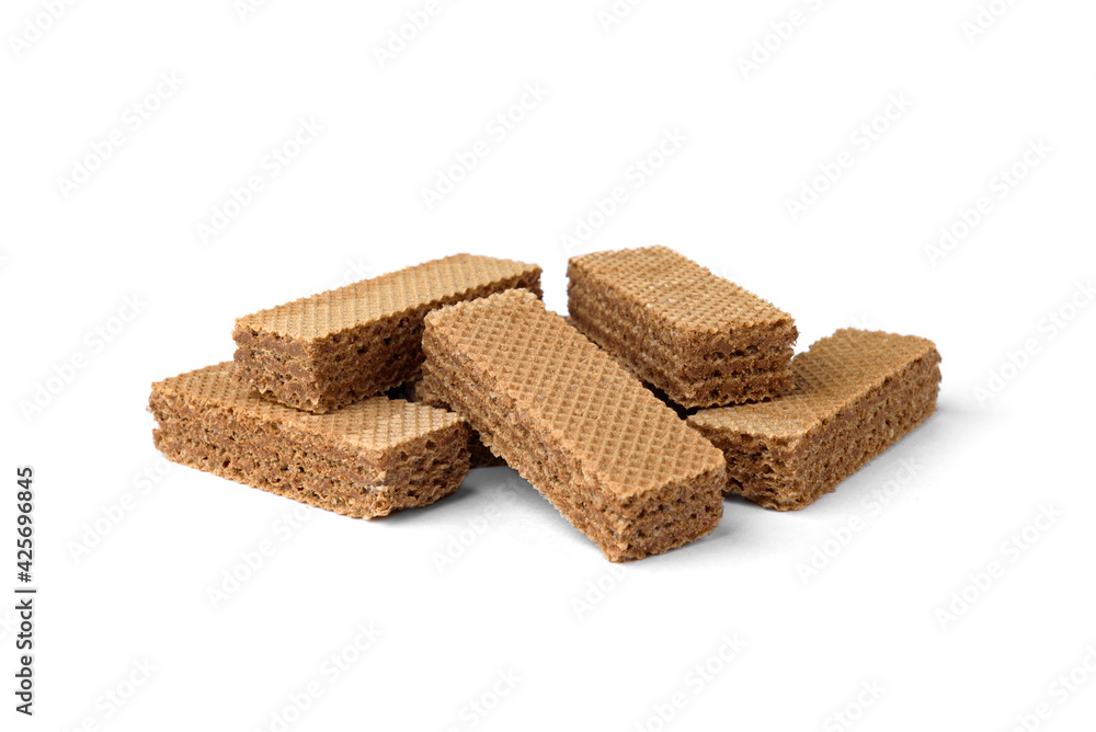 Heap of dark wafer biscuits isolated on white background Heap of dark wafer biscuits isolated on white background
