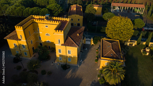 Top view of an old yellow villa in the Tuscan region.Italy photo