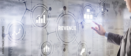 Revenue. Raising income concept. The businessman plans to increase his revenue photo