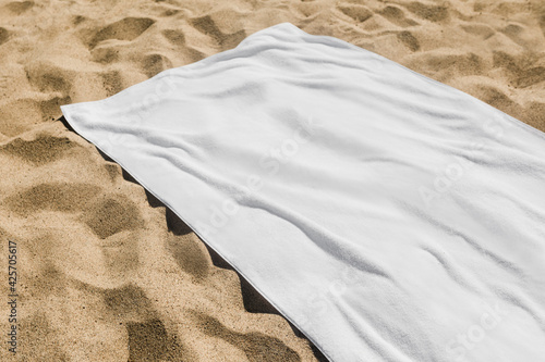 Fotografie, Obraz White beach towel on the sand