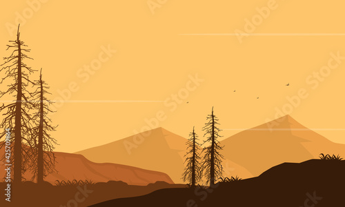 A fantastic view of silhouetted mountains and dry trees at dusk in the evening. Vector illustration