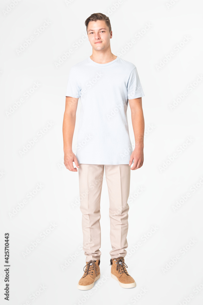 Man in white t-shirt and beige slacks full body Man in white t-shirt and beige slacks full body