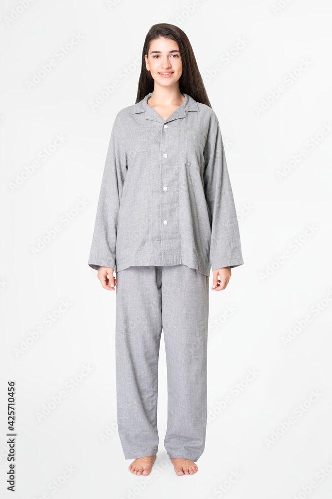 Woman in gray pajamas comfy sleepwear apparel full body Woman in gray pajamas comfy sleepwear apparel full body