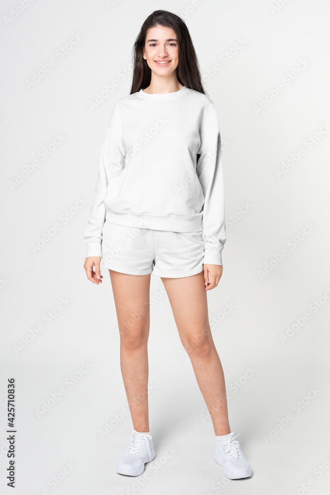 Woman in basic sweater and shorts casual apparel full body Woman in basic sweater and shorts casual apparel full body