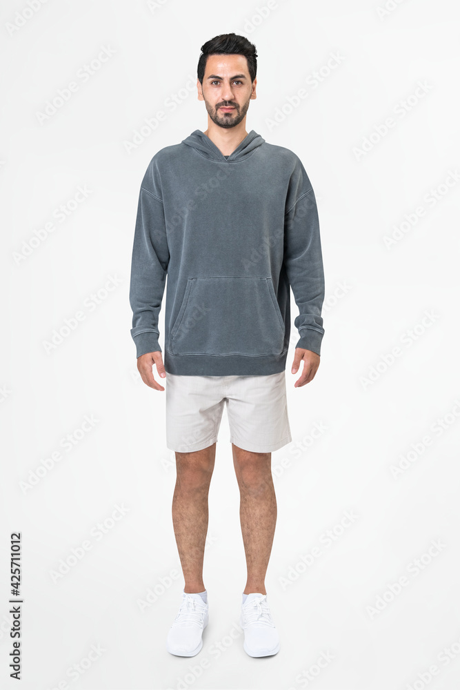 Fototapeta premium Trendy man in gray hoodie street fashion full body