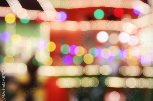 The luminous rays from the lanterns are multicolored, from the bokeh effect of the photo lens