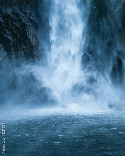 Base of Stirling Falls in Milford Sound, New Zealand. Vertical format.