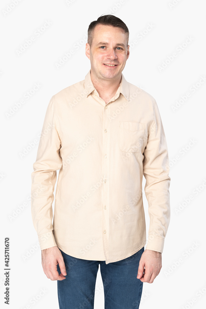 Man wearing beige long-sleeve shirt Man wearing beige long-sleeve shirt
