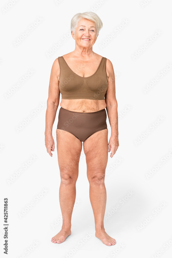 Foto de Size inclusive senior woman in brown lingerie studio