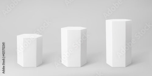 White 3d hexagon podium set with perspective isolated on grey background. Product podium mockup in hexagon shape, pillar, empty museum stages or pedestal. 3d basic geometric shape vector illustration