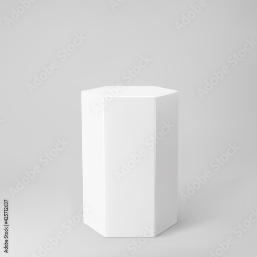 White 3d hexagon podium with perspective isolated on grey background. Product podium mockup in hexagon shape, pillar, empty museum stage or pedestal. 3d basic geometric shape vector illustration