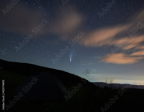 Incredible view of beautiful blue sky with stars and incredible nature. Comet Neowise. Concept of fresh air and wonderful view starry sky at night.
