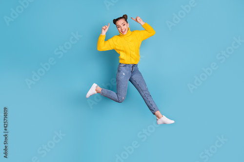 Full body portrait of pretty cheerful lady indicate fingers hair toothy smile isolated on blue color background