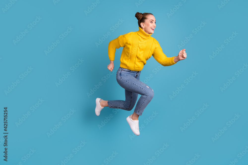 Full size profile portrait of crazy energetic lady running look empty space isolated on blue color background