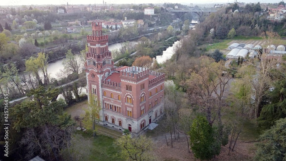 Europe, Italy, Crespi d'Adda closed to Bergamo and Milan is the best preserved workers' village , Founded in 1877 by Cristoforo Crespi - drone aerial view of textile industry - Unesco Heritage world