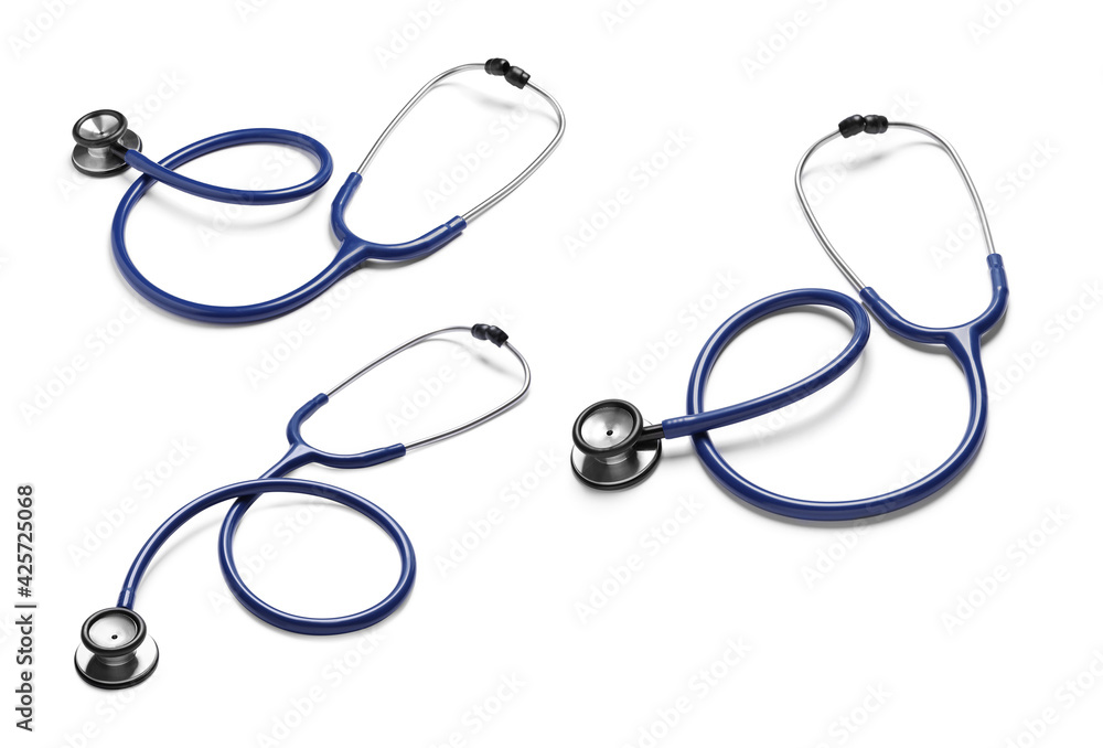 Set with stethoscopes on white background Set with stethoscopes on white background