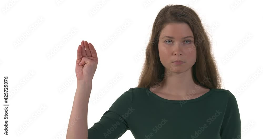 Young Caucasian woman looking at camera and asking for help with hand gesture. Signal for help. Domestic violence. Isolated on white background Young Caucasian woman looking at camera and asking for help with hand gesture. Signal for help. Domestic violence. Isolated on white background
