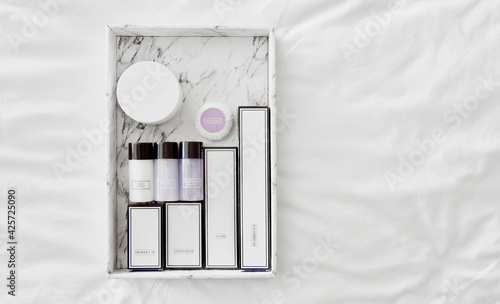 Top view of bathroom amenities set for hotel service, cosmetic products
