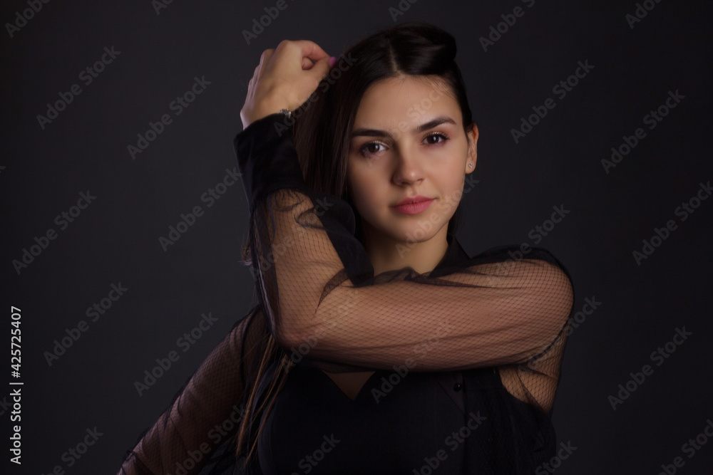portrait of a young woman with long brown hair. portrait of a young woman with long brown hair.