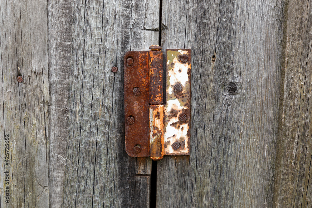 Old rusty metal door hinge Old rusty metal door hinge