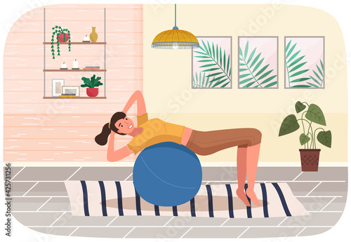 Woman doing fitness exercise at home. Young girl is engaged in pilates with ball. Gymnastic lesson