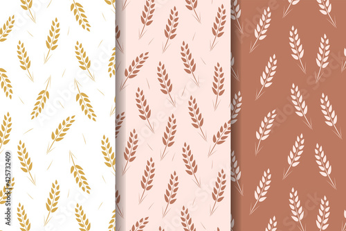 Set of three Seamless pattern of wheat ears. Vector Wallpaper background of ears of grain crops.