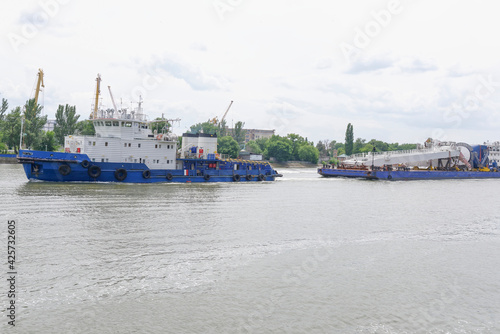 Transporting marine crane parts along the river in Rostov-on-Don
