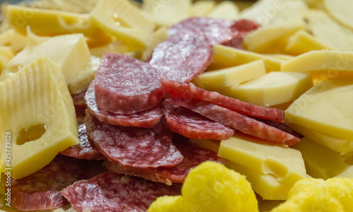 Salad appetizers, cheese and salame