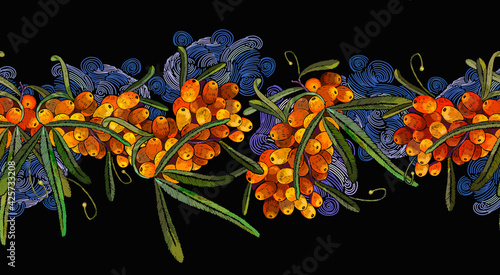 Sea buckthorn berries branch and night sky. Autumn garden art. Horizontal seamless pattern. Embroidery design. Fashion template for design of clothes, tapestry