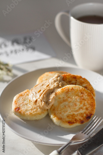 cheese pancakes with peanut butter and coffee healthy breakfast